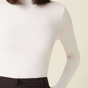 See-through white turtleneck